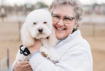 Woman-with-Dog-at-Riverside-Dog-Park